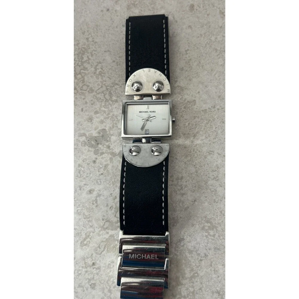 Michael Kors Women’s Rectangle Quartz Watch Silver Dial Black Leather Strap Date